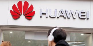 After Huawei blow, China says U.S. must show sincerity for talks