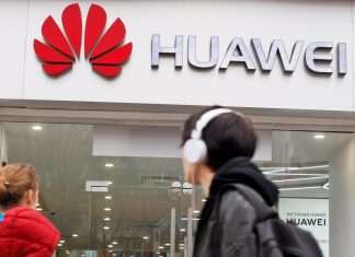 After Huawei blow, China says U.S. must show sincerity for talks