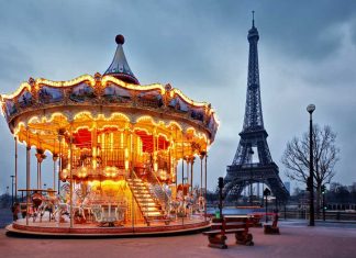 Vintage carousel close to eiffel tower, paris